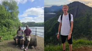nature-scene-from-an-MPC-event-walk-and-talk-two-men-sit-on-a-log-bench-by-a-lakeside-with-lush-greenery-and-a-bright-blue-sky-in-the-background-anothe