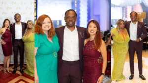 Ronaldo-Hare-posing-with-Dr-Su-Lee-and-other-attendees-at-the-2025-Ladies-First-Awards-including-a-moment-holding-an-award