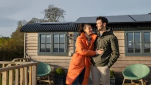 A-couple-embracing-outdoors-symbolizing-the-harmony-the-777-rule-can-bring-to-your-love-life