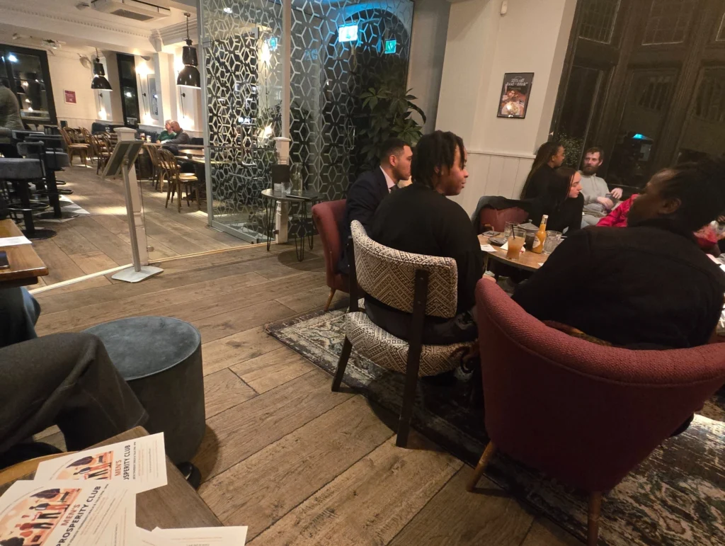 Image-showing-the-interior-of-the-venue-with-guests-engaged-in-the-event