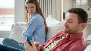 Signs-your-partner-is-cheating-woman-looking-suspiciously-at-partner