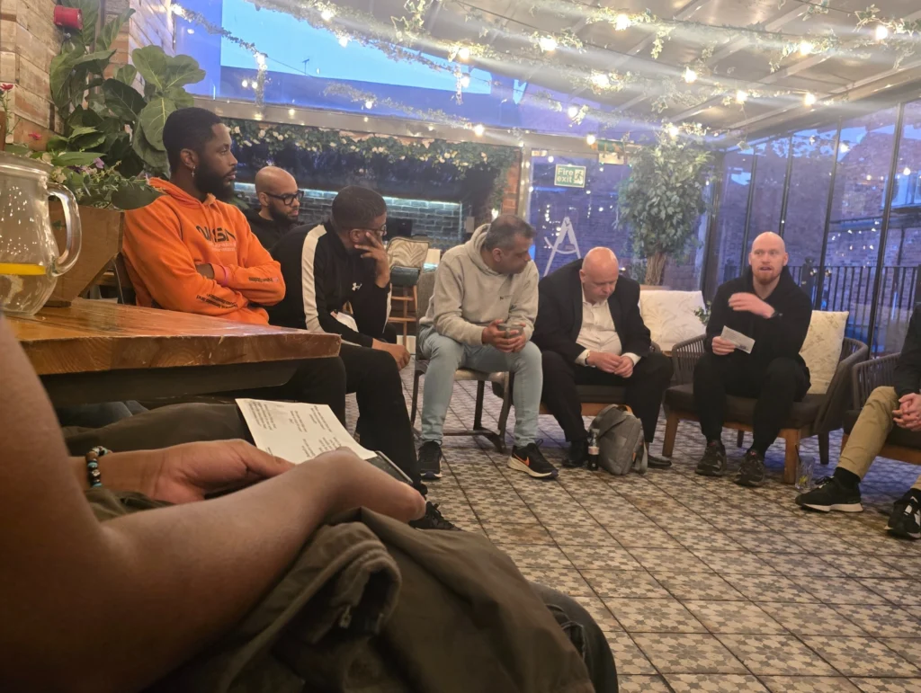 Another-view-of-participants-at-the-MPC-event-engaged-in-a-conversation-with-focus-on-relationship-discussions