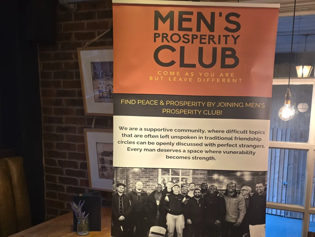 Banner-for-Men's-Prosperity-Club,-showcasing-a-supportive-community-where-men-can-discuss-difficult-topics-and-find-peace