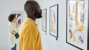 A-man-practicing-Slow-Looking-as-he-observes-abstract-art-in-an-art-gallery