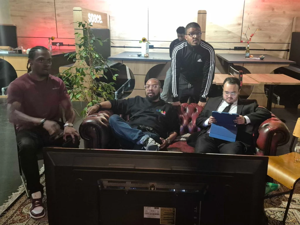 Group-of-attendees-socializing-while-gaming-Games-Social-October-2025