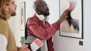 Two-people-discussing-and-practicing-Slow-Looking-while-admiring-an-abstract-painting-in-an-art-galler