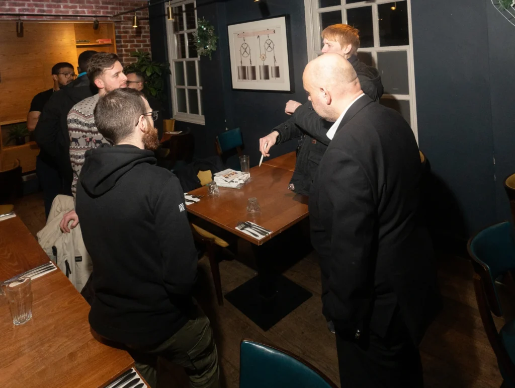 Group-discussing-finance-topics-in-a-restaurant