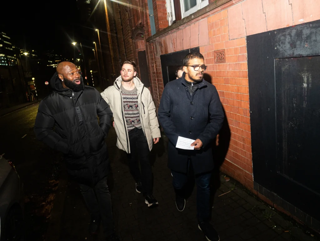 Group-walking-together-at-night-in-the-city-reflecting-on-relations-topics