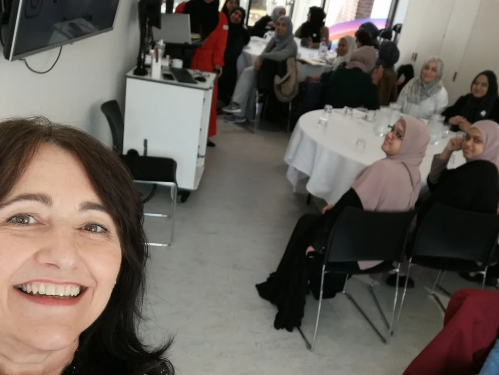 iwd-workshop-spotlight-on-womens-health-pd-workshop-selfie-with-community-participants