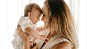 mother-holding-baby-world-maternal-mental-health-day-awareness