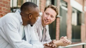 Two-men-talking-openly-and-supporting-each-other-through-Relationship-Stress